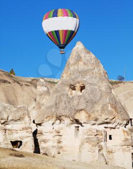 Royalty Free Photo of a Hot Air Balloon Over Cappadocia in Turkey