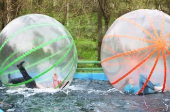 Royalty Free Photo of People in Zorb Balls
