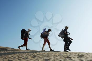 Royalty Free Photo of a Group Hiking in the Desert