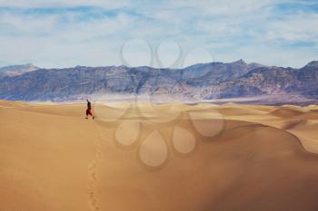 Royalty Free Photo of a Hiker in Death Valley National Park, USA