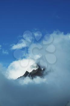 Royalty Free Photo of the Himalayan Mountains in the Clouds