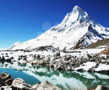 Royalty Free Photo of Shivling Peak and Lake in the Himalayas
