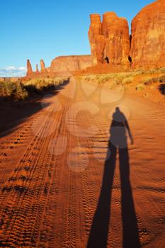 Royalty Free Photo of a Shadow of a Man in Monument Valley in Utah, USA