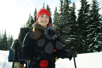 Royalty Free Photo of a Woman Backpacking in Snow