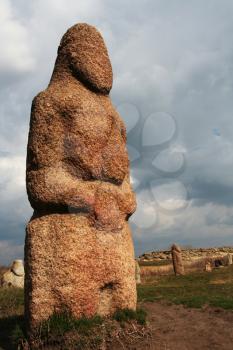 Royalty Free Photo of an Ancient Stone Statue 