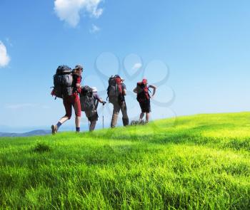 Royalty Free Photo of Backpackers going up in Crimean mountain