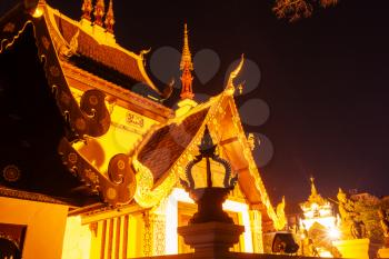 Night view buddhist temple in Chiang Mai, Northern Thailand.