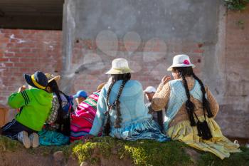 People  in authentic clothes in Bolivia 