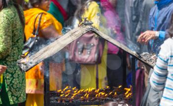 Candle at buddhist temple, Nepal