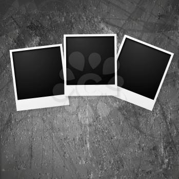 Polaroid photo frames on grunge wall. Vector background