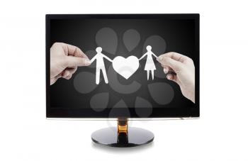 monitor with a paper family in hands isolated on white