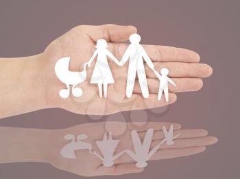 Paper family in hands
