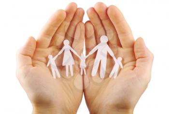 Paper family in hands isolated on white background