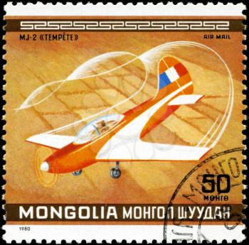 MONGOLIA - CIRCA 1980: A Stamp printed in MONGOLIA shows the MJ-2 Tempete Plane, from the series 10th World Aerobatic Championship, circa 1980