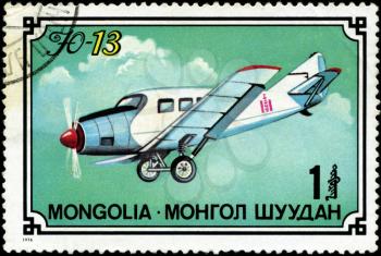 MONGOLIA- CIRCA 1976: A stamp printed in Mongolia shows airplane U-13, series, circa 1976
