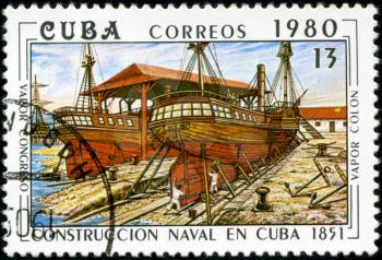 CUBA - CIRCA 1980: A stamp printed by the Cuban Post shows construction of two Cuban steamships Congreso ; and Colon, built in 1851, circa 1980