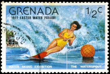 GRENADA - CIRCA 1977: A stamp printed in Grenada issued for the easter water parade  shows skiing exhibition, circa 1977.