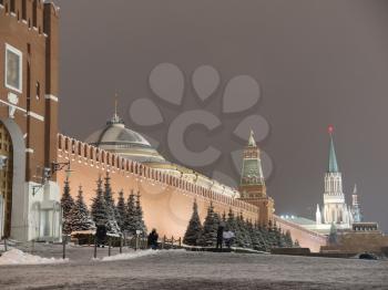 Spasskaya Tower of Moscow Kremlin at Red Square in winter Moscow Russia.