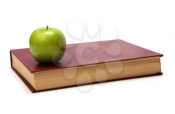 book with apple isolated on white background