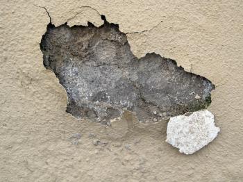Royalty Free Photo of Water Damaged Peeling Paint on External Wall
