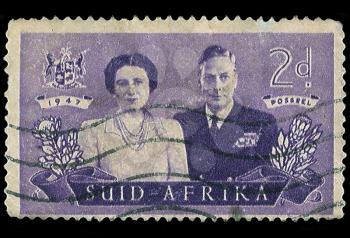 Royalty Free Photo of a South African Stamp of King George VI and Wife