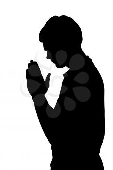 Side profile portrait silhouette of a religious teenage boy praying 