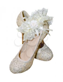 shoes with garter for bride isolated on white background