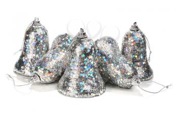 silver handbell decoration for a christmas and new-year tree isolated on white background