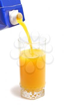orange juice in packing and glass isolated on white background