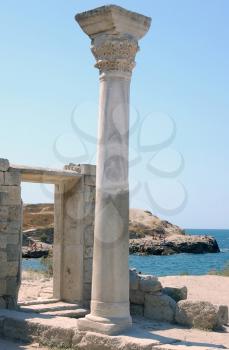 ancient pillar on background blue sky