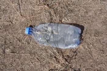 plastic bottle on the ground