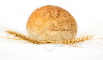 Wheat and bread on a white background