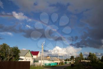 rainbow in the sky in the village
