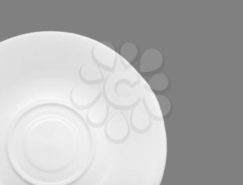 saucer on a gray background