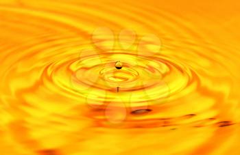 A drop of golden water. macro