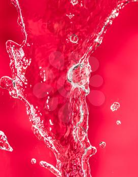 spray water on the red background