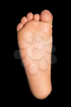 foot on a black background