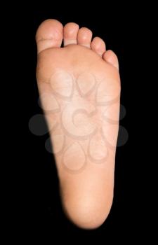 foot on a black background