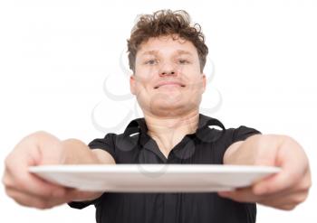 Chef cook holding an empty plate on white background