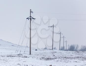 electric poles in winter outdoors