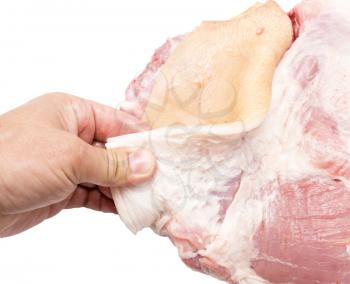 pork meat in a hand on a white background