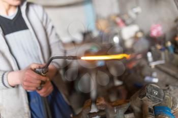 Tool gas welding worker in the workshop