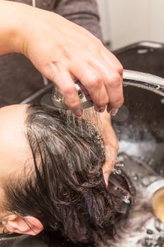 Washing of female hair in a beauty salon