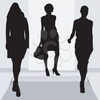 Royalty Free Clipart Image of Silhouettes of Three Women on a Grey Background
