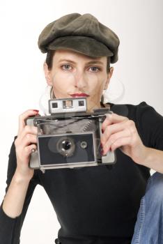 Beautiful girl whit vintage camera, retro photo