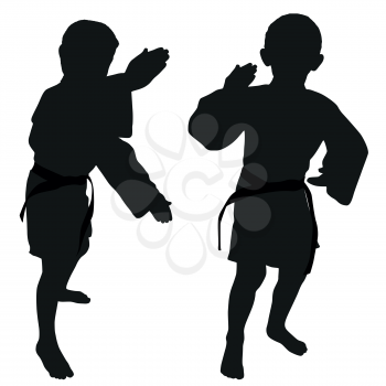 Silhouettes of two little boys who playing karate