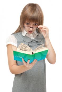Royalty Free Photo of a Girl Reading a Book