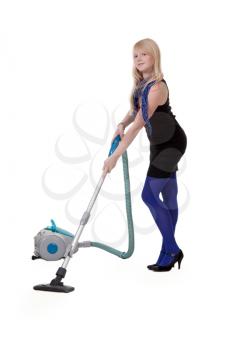 Royalty Free Photo of a Young Girl With a Vacuum Cleaner