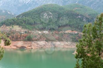 Royalty Free Photo of a Lake at the Base of a Mountain