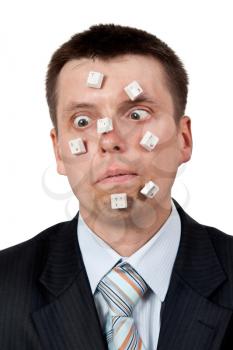 Royalty Free Photo of a Businessman With Computer Keys on His Face